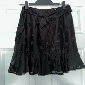 Black star skirt with ruffles (size small)